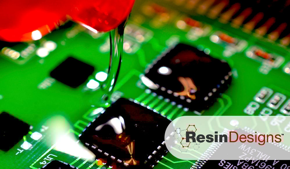 Epoxy encapsulant being applied to a PCB
