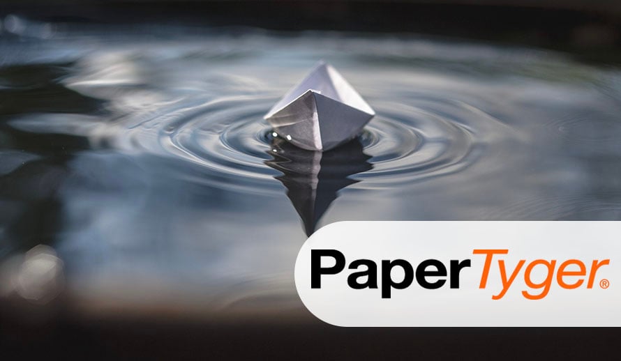 Paper made boat floating on water