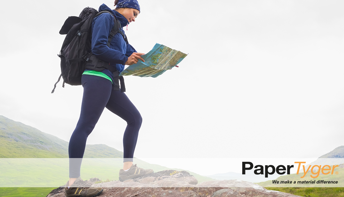 Woman Hiking with Durable Printing Paper Map