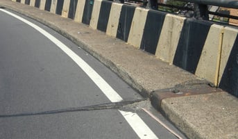 Worn out expansion joints on a bridge deck