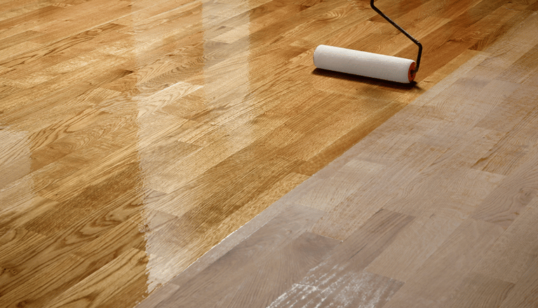 wooden floor being coating with urethan coatings