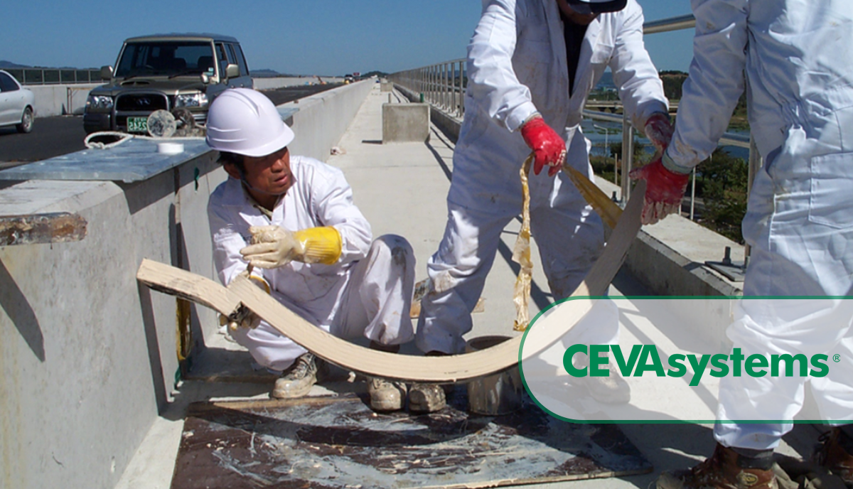 Road crew installing expansion joints on a bridge deck