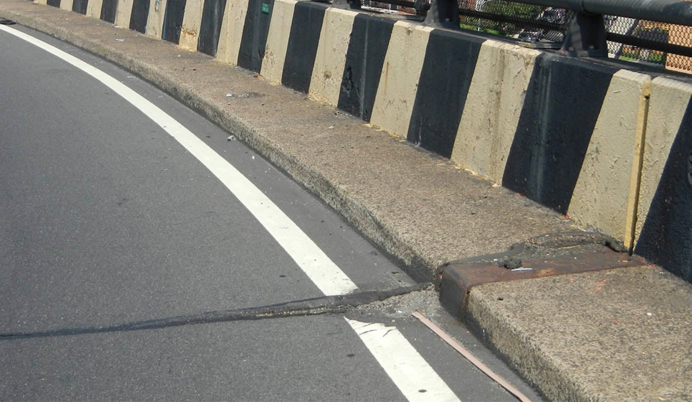 Worn out expansion joints on a bridge deck