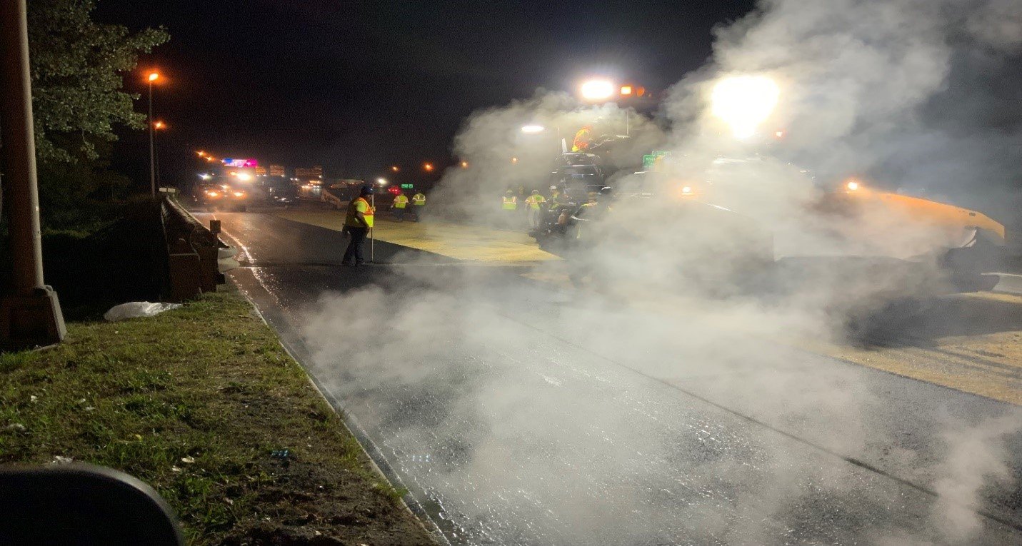 After the initial pass of the roller during a nightshift paving